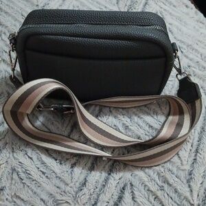 Grey with multi color brown strap.